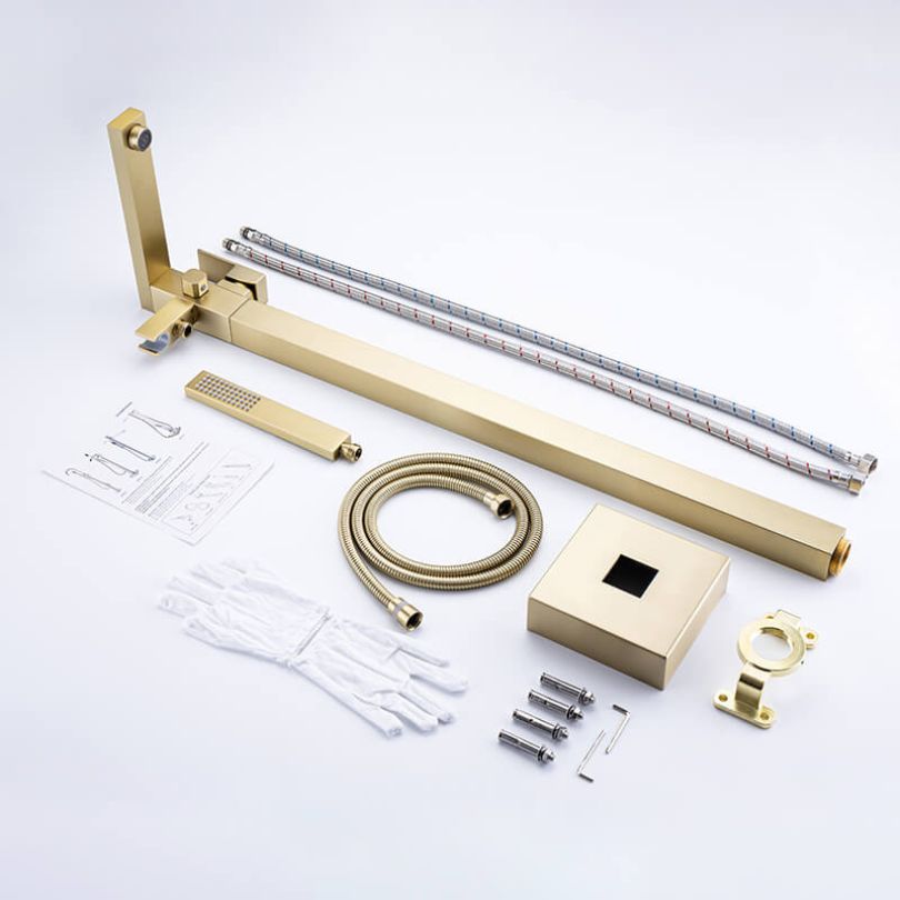 Luxurious brushed gold bathtub faucet installed in a stylish modern bathroom.