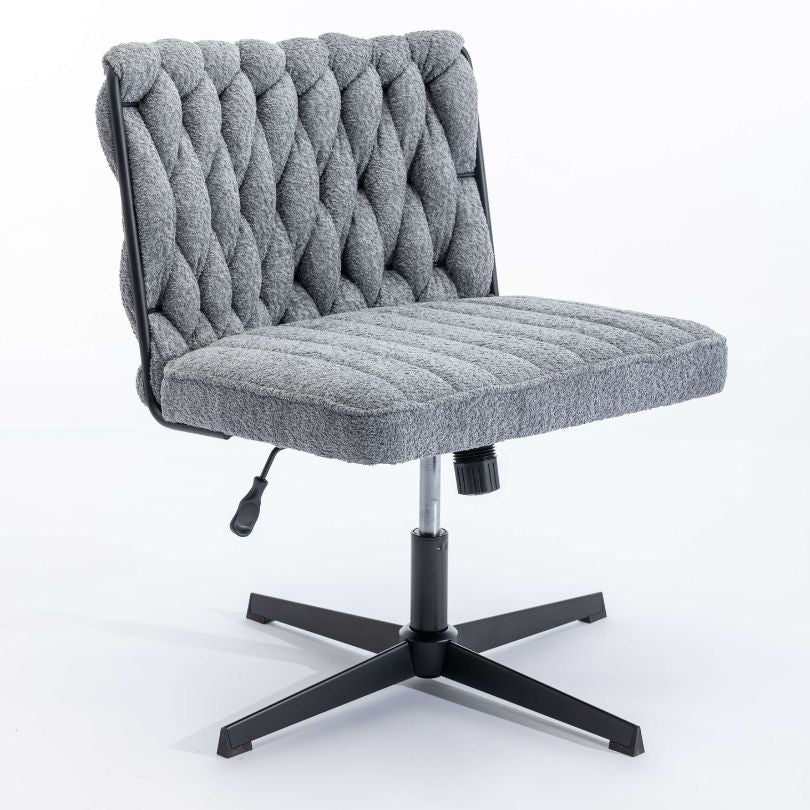Close-up of the luxurious padded seat and backrest of the swivel office chair.