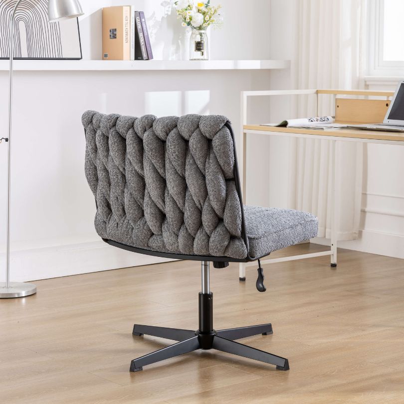 Office setup featuring the grey armless swivel chair, demonstrating its stylish integration.