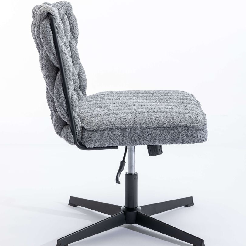 Office setup featuring the grey armless swivel chair, demonstrating its stylish integration.