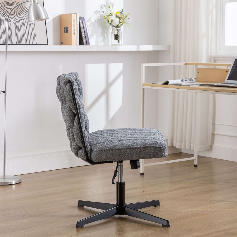 Premium grey armless swivel office chair showcasing its elegant design and comfort features.