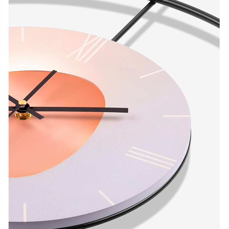 Elegant 3D round metal wall clock on a stylish living room wall.