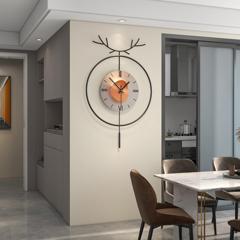 Close-up view of the luxury round metal wall clock highlighting its 3D design.