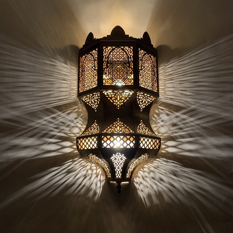 Close-up of the Majestic Moroccan wall sconce showcasing its intricate hand-pierced design.