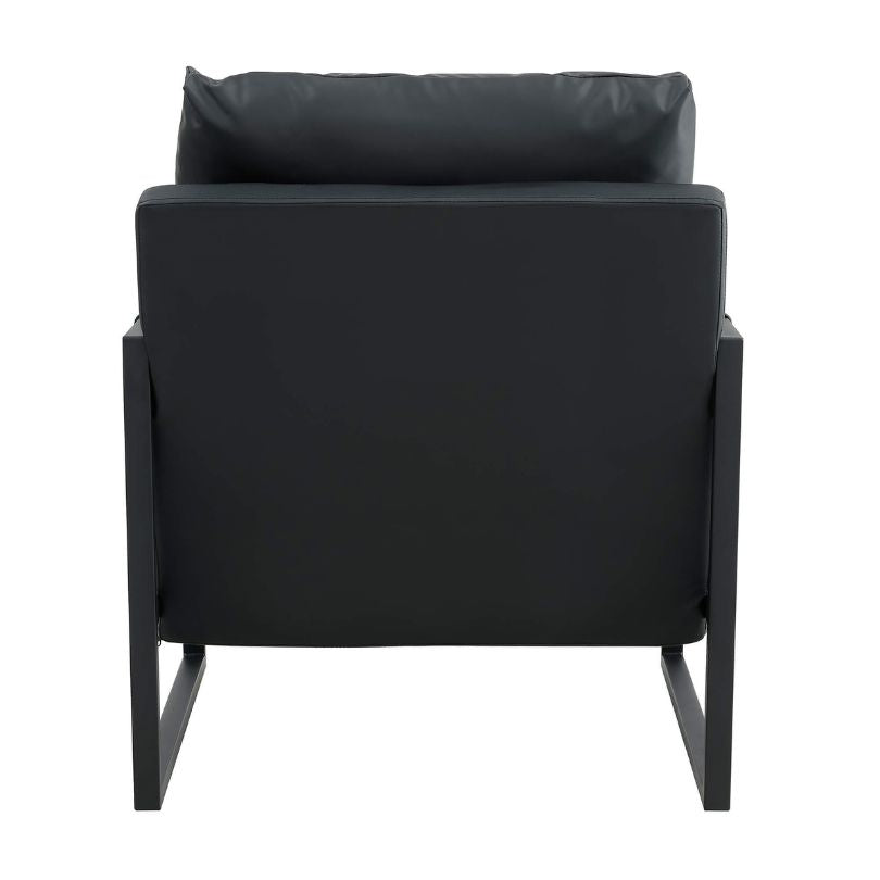 Elegant mid-century accent chair in a cozy reading nook with books and a soft throw blanket.