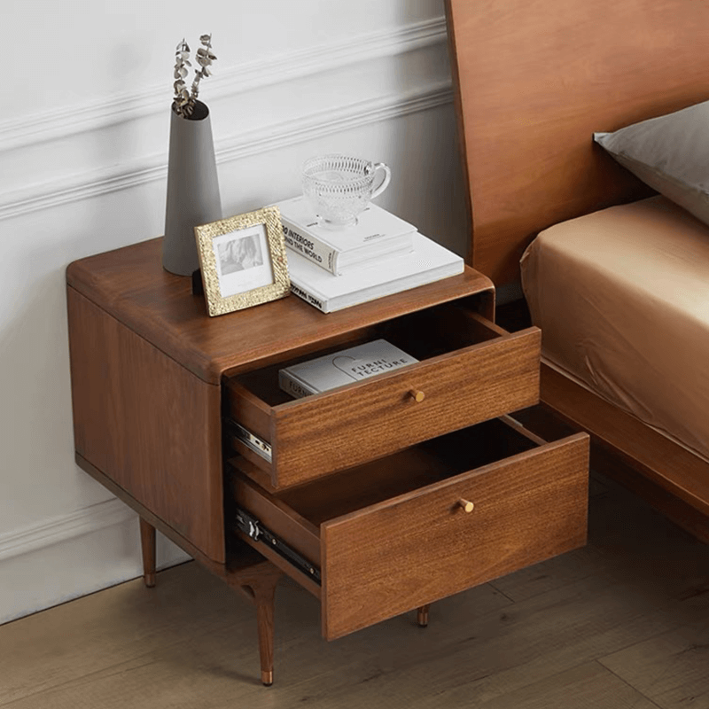 Top-down shot showing spacious surface area on bedside table styled with book and mug