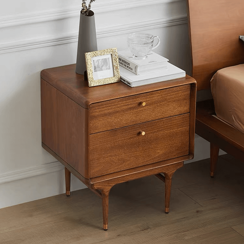 Top-down shot showing spacious surface area on bedside table styled with book and mug