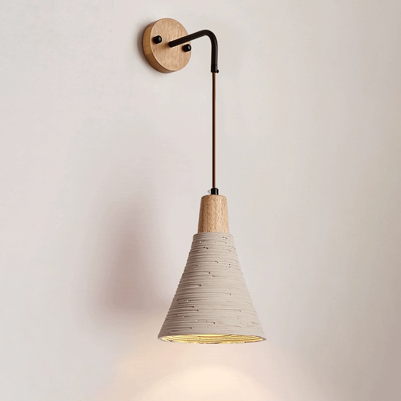 Adjustable wall sconce providing soft lighting in a restaurant interior