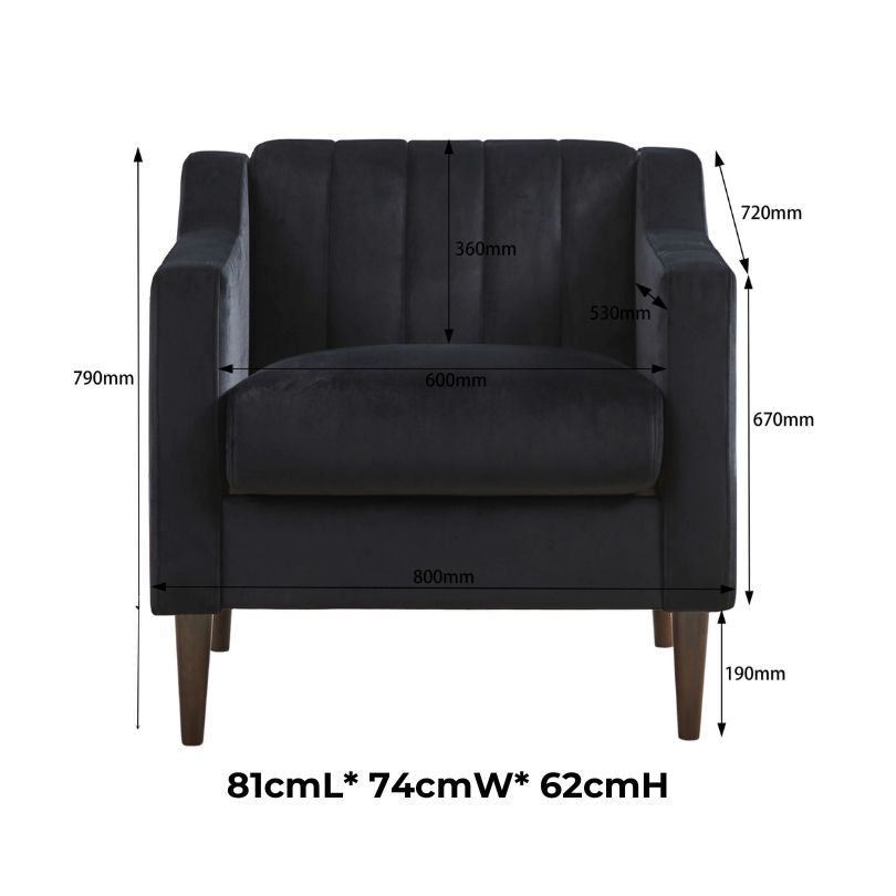Close-up of the velvet material on the tufted accent chair with wooden legs.