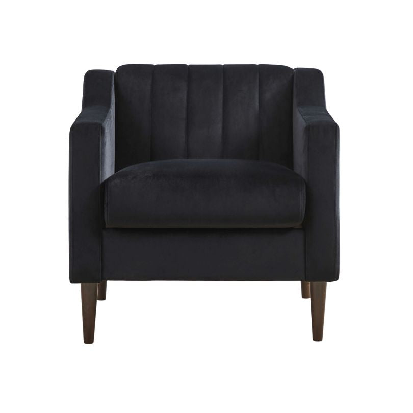 Side view of the stylish black barrel chair showcasing its tufted design.