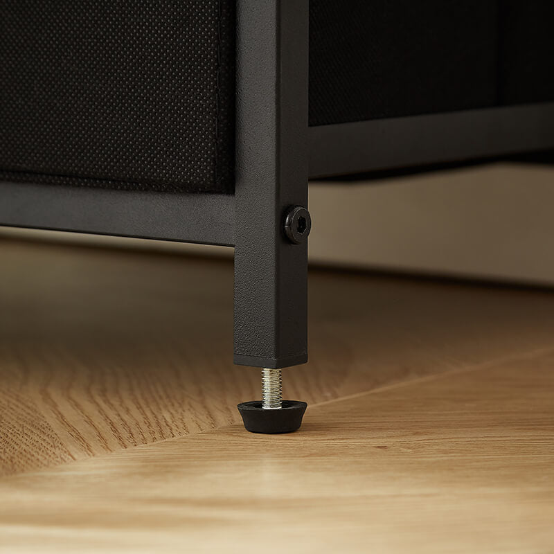 Open drawer of the mid-century modern bedside table revealing ample storage space.