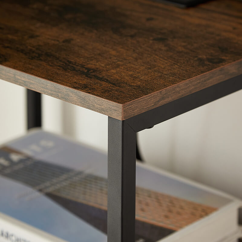 Open drawer of the mid-century modern bedside table revealing ample storage space.