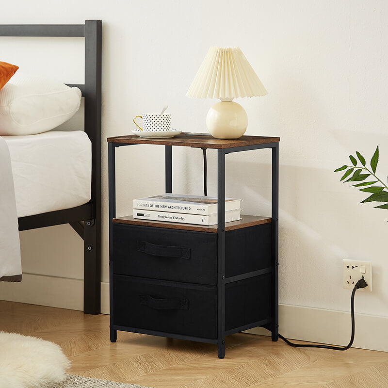 Open drawer of the mid-century modern bedside table revealing ample storage space.