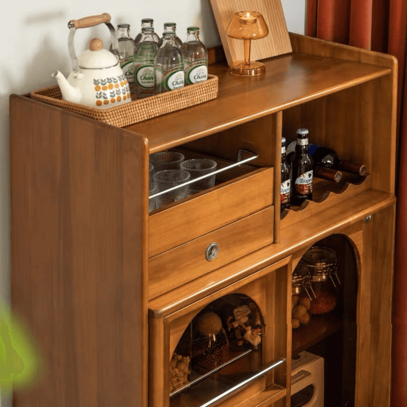Side angle of the mid century modern wine cabinet displaying open storage for wine bottles and closed cabinets.