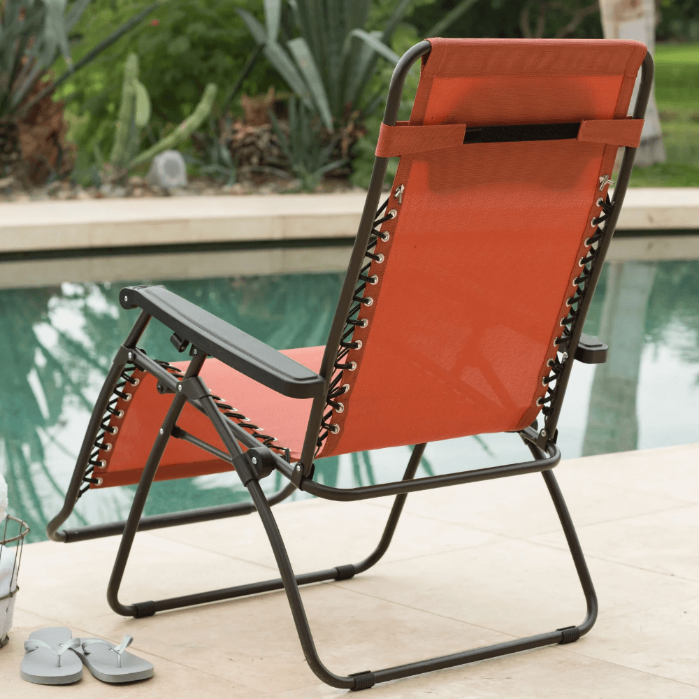 Close-up of the comfortable seating and headrest of the Caravan Comfort Blue Folding Outdoor Chair.