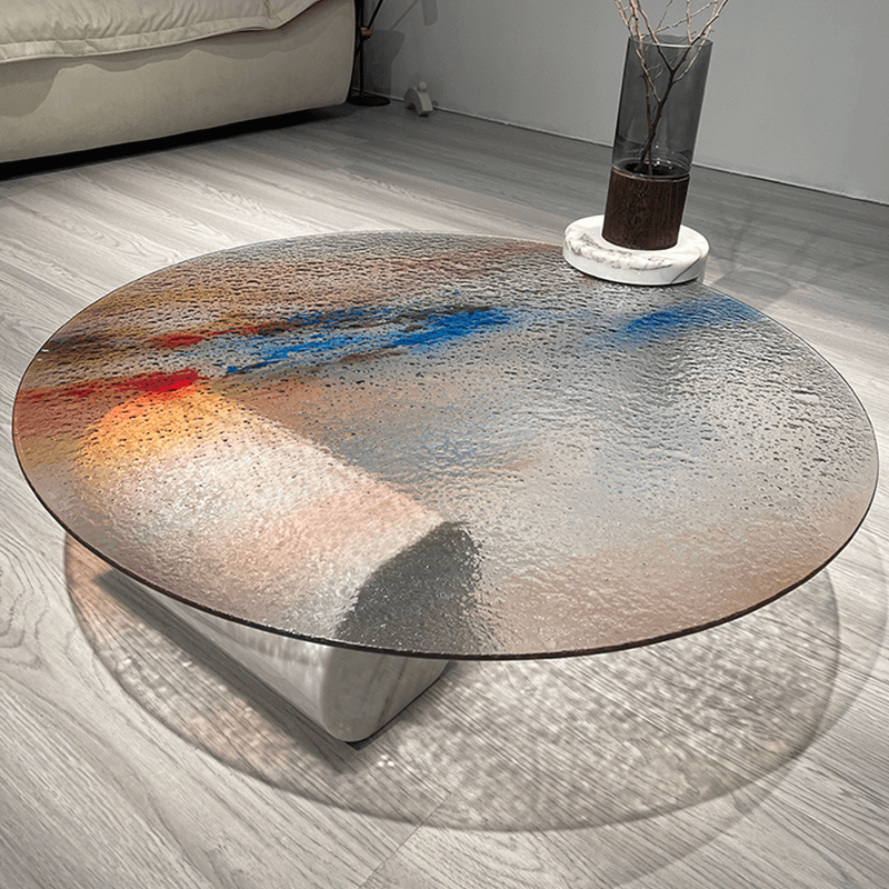 Close-up of the colorful surface of the ripple glass coffee table highlighting its artistic design.
