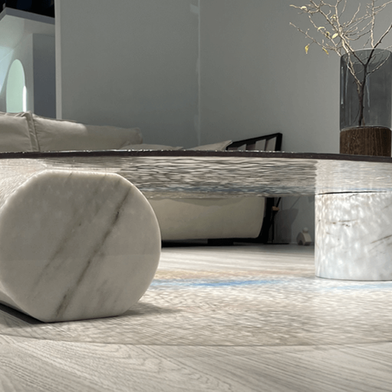 Close-up of the colorful surface of the ripple glass coffee table highlighting its artistic design.