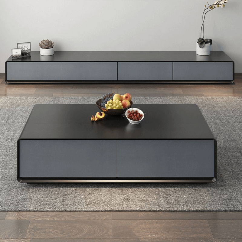 Chic walnut coffee table with four drawers in a cozy living room setting.