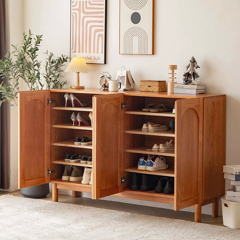 Front view of the elegant solid wood shoe cabinet with doors, showcasing its minimalist design and spacious storage.