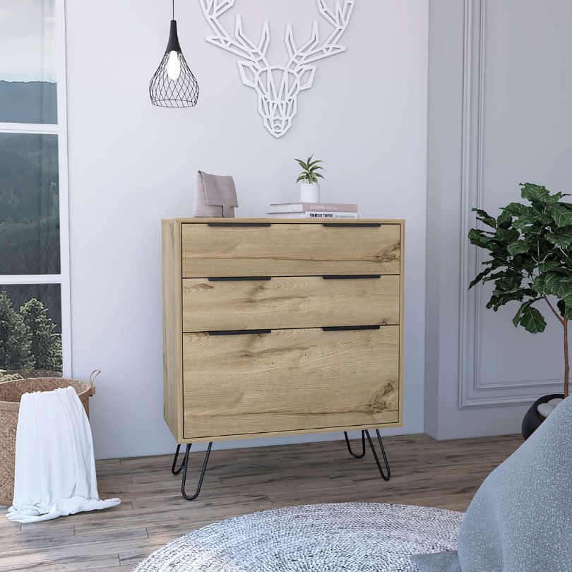 Elegant minimalist wooden chest drawer with three spacious drawers and brass pin legs, perfect for contemporary decor.