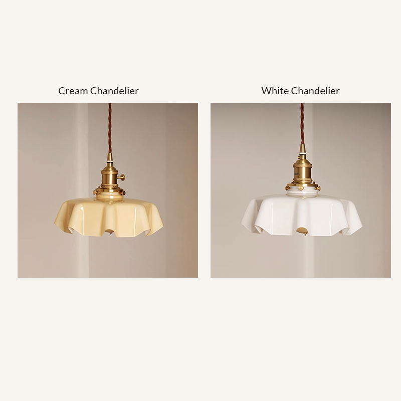 Wavy glass pendant light hanging in a stylish kitchen, showcasing its elegant design.