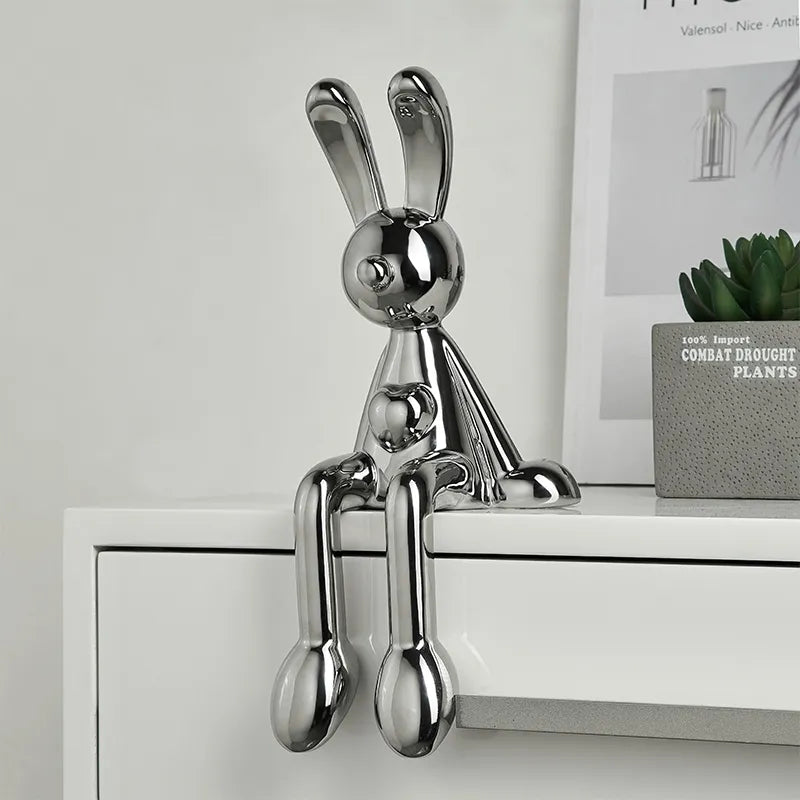 Large ceramic rabbit figurine artfully arranged on a coffee table, perfect for modern living spaces.
