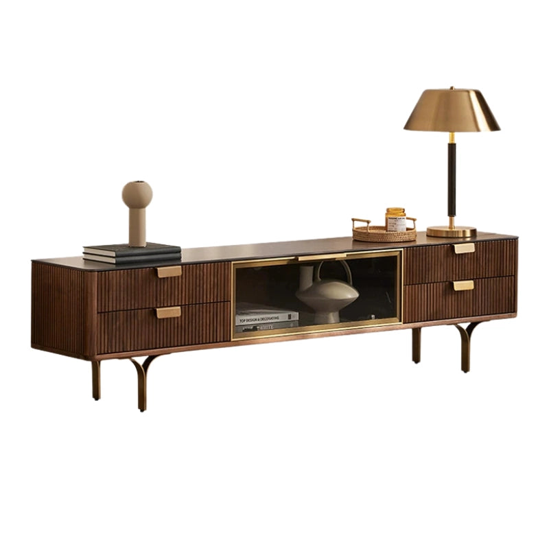 Elegant walnut TV stand with glass door and stainless steel legs in a bright living room.