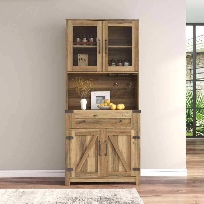 Side angle of the modern barn door accent cabinet, highlighting its spacious interior and shelves.