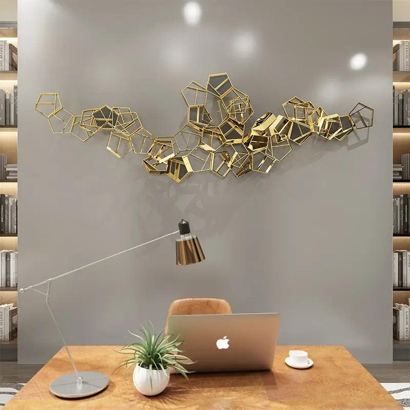 Elegant 3D geometric metal wall art displayed in a contemporary living room.
