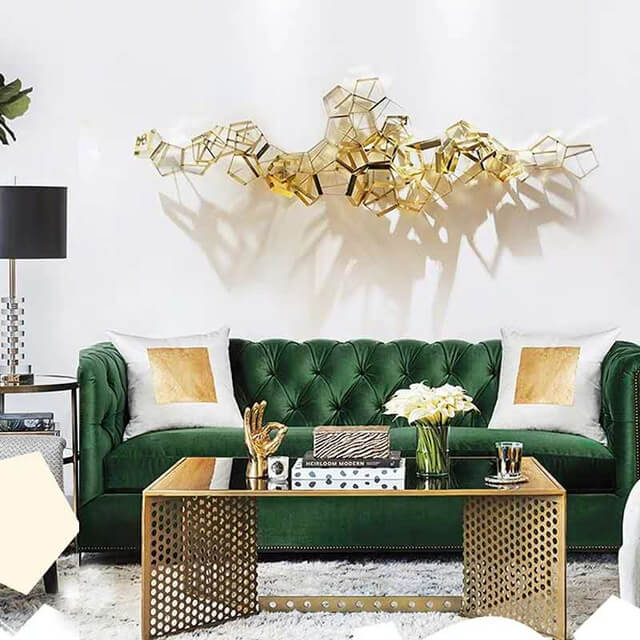 Close-up of the reflective surface of the modern geometric wall decor.