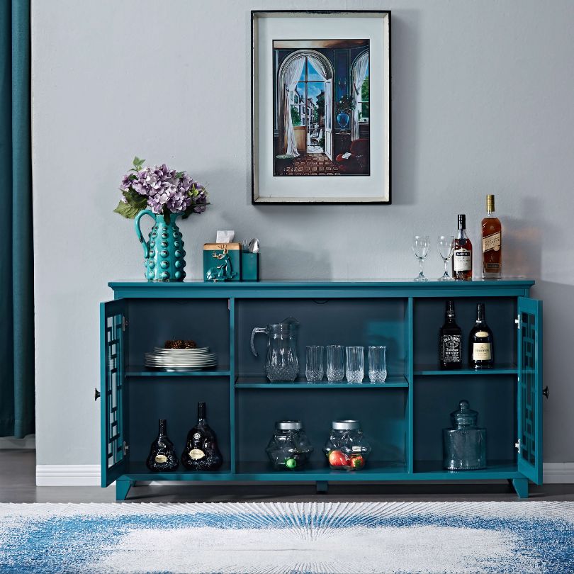 Dining setup featuring stylish glass door cabinet for dining area with teal accents.