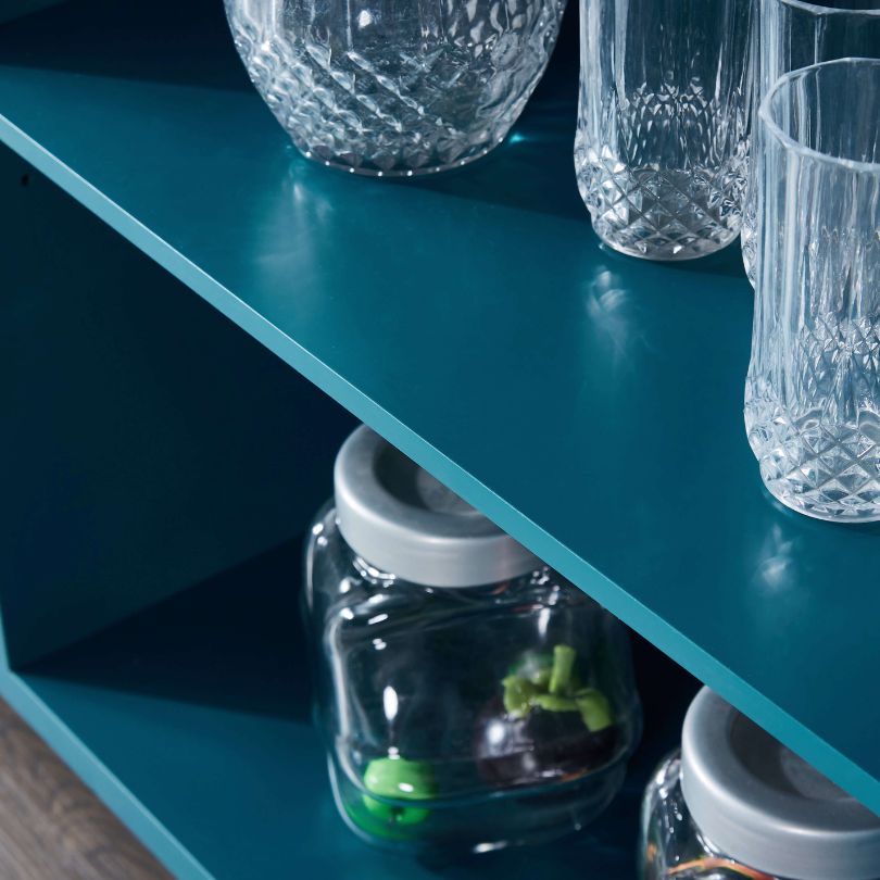 Side angle showing adjustable shelving inside modern storage buffet cabinet.
