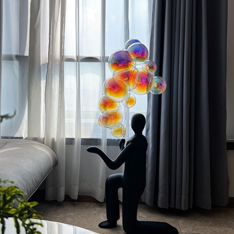 A living room setting featuring the modern abstract bubble sculpture as a centerpiece.