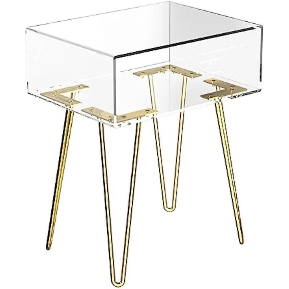 Modern acrylic nightstand styled with a lamp and books on top.