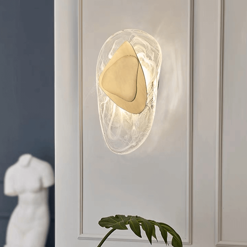 Close-up view of the stylish glass lamp, highlighting the tri-tone finish in bronze, black, and clear.