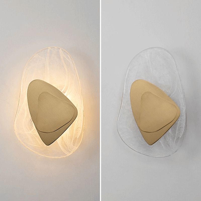 The wall lamp installed in a cozy corner, demonstrating its own light source and decorative appeal.