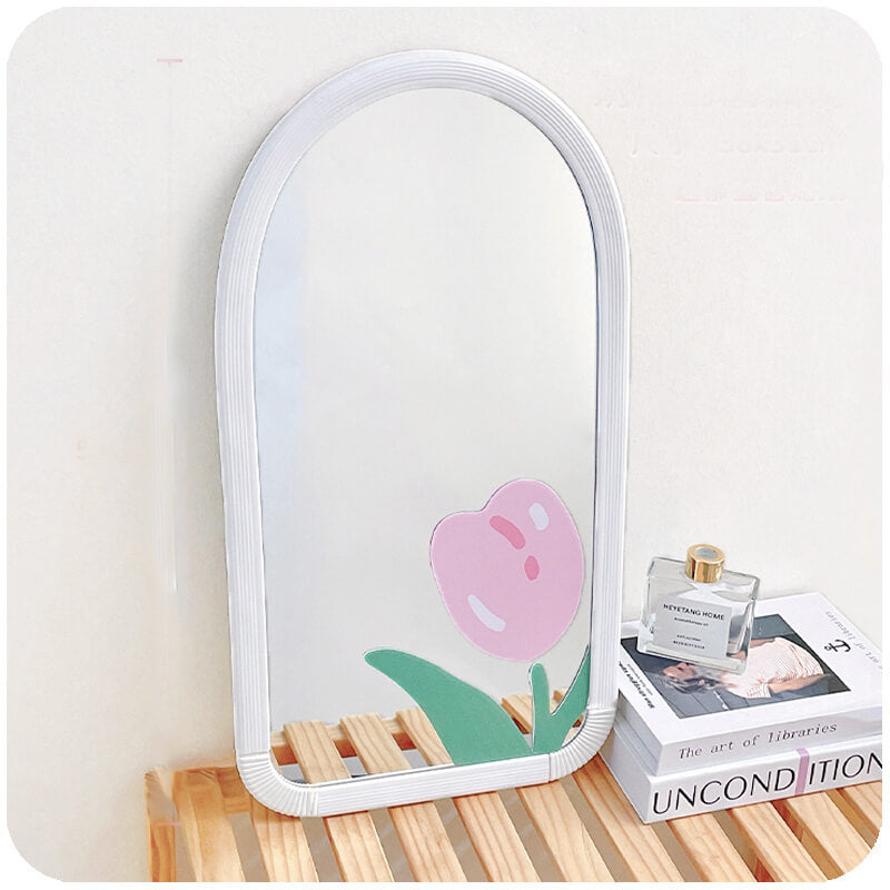 Wall-mounted aesthetic mirror in a girls bedroom, highlighting its contemporary style and color options.
