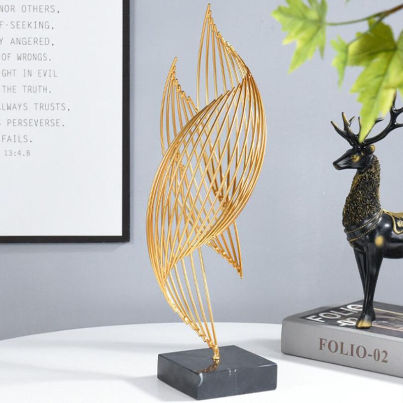 Close-up of the abstract metal sculpture highlighting its intricate design.