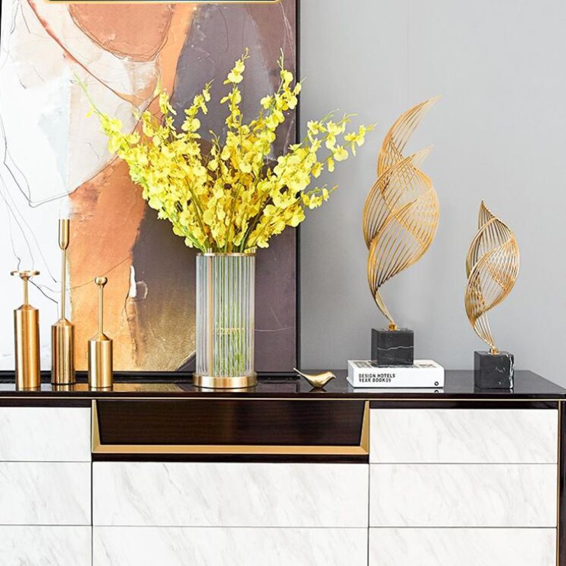 Contemporary wavy metal ornament displayed in a modern living room.