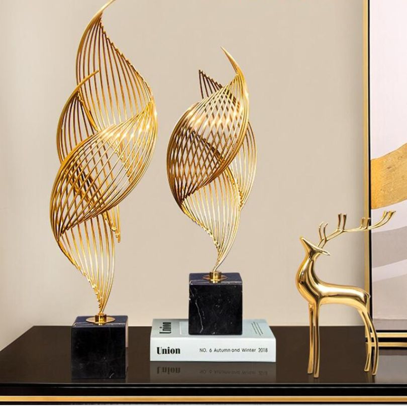 Contemporary wavy metal ornament displayed in a modern living room.