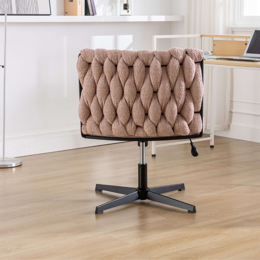Close-up view of the velvet fabric and ergonomic features of the armless office chair, highlighting comfort.