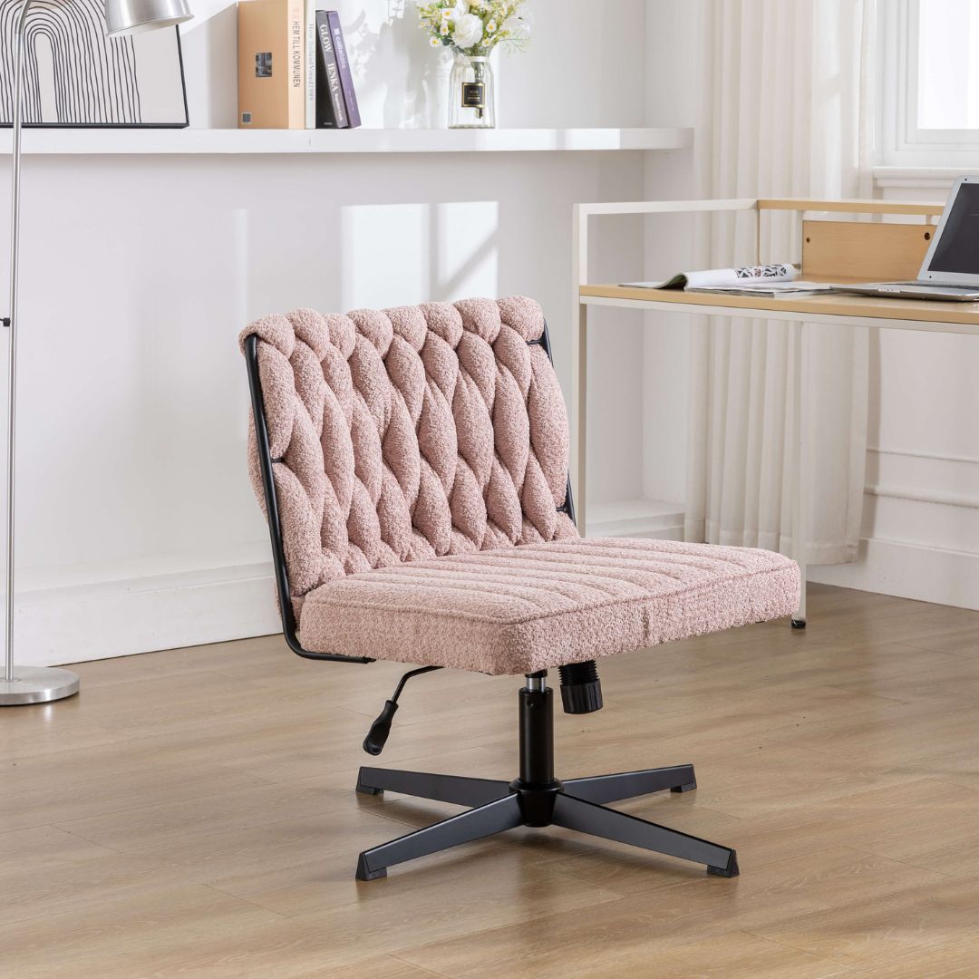 Close-up view of the velvet fabric and ergonomic features of the armless office chair, highlighting comfort.