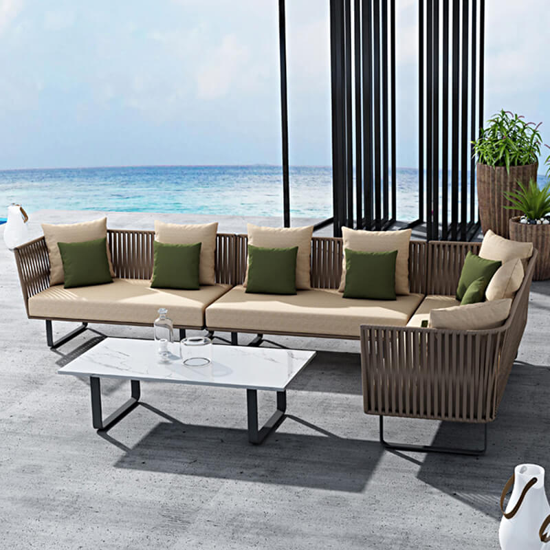 Family enjoying time together on the Elegant Rattan Modular Outdoor Sofa Set by the poolside.
