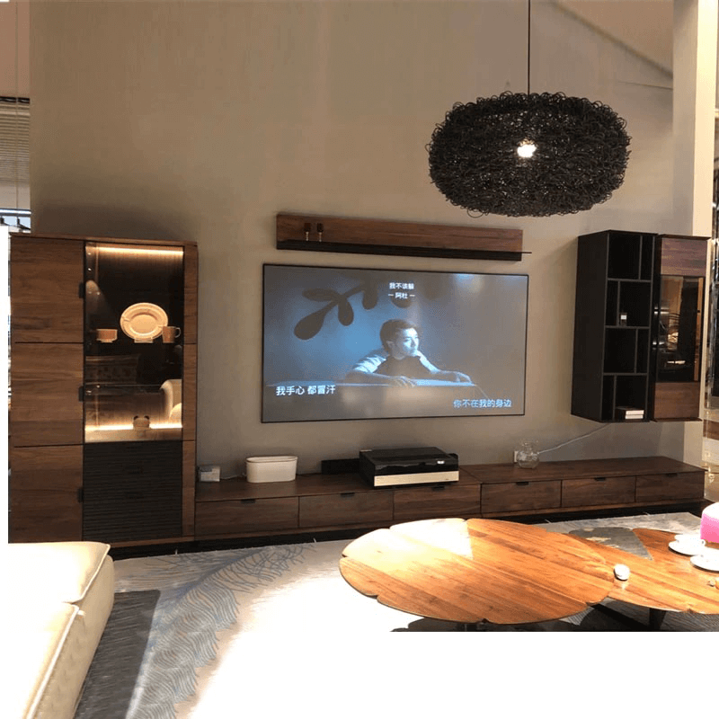 Close-up of the glass door on the modern wine cabinet highlighting the elegant design.