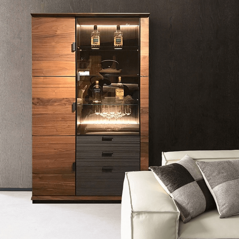 Close-up of the glass door on the modern wine cabinet highlighting the elegant design.