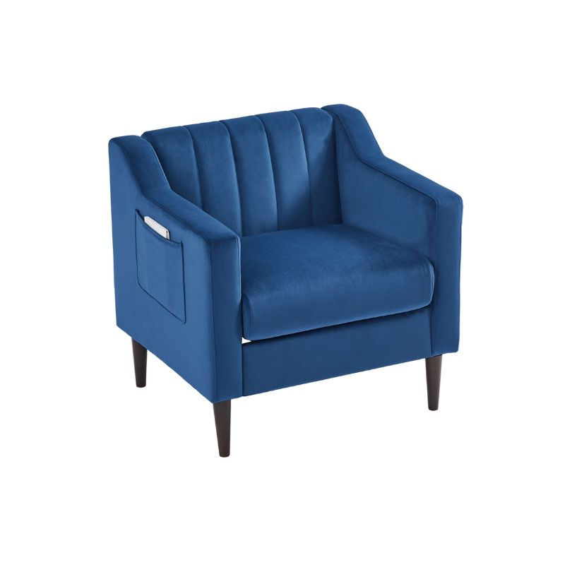 Front view of the modern blue accent chair in a stylish living room setting, highlighting its tufted details.