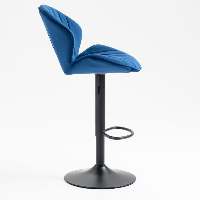 Stylish blue velvet bar stools showcasing adjustable base functionality