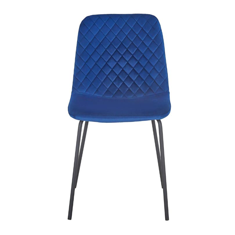 Close-up of the steel frame and velvet upholstery of a blue velvet chair, emphasizing durability and comfort.