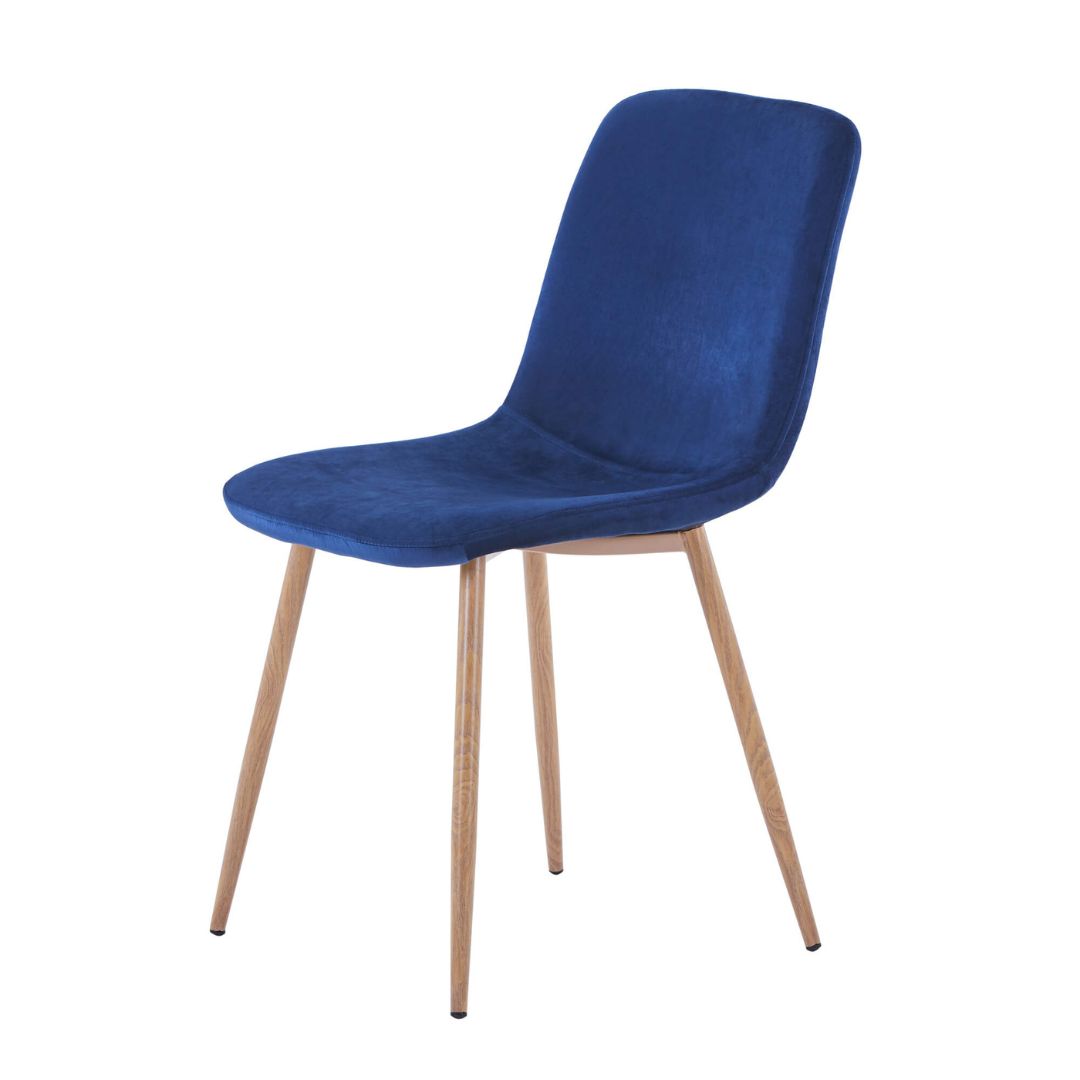 Elegant blue velvet dining chair from the side, highlighting its modern design and plush upholstery.