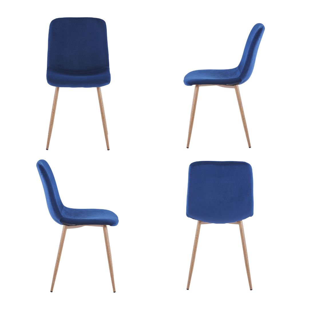 Blue velvet kitchen chair in a dining room setting, demonstrating its versatility and elegance.
